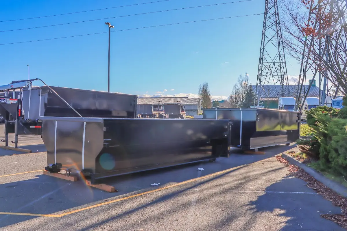 Roll-off dumpster ready for waste disposal at job site for Demolition Dumpster Rental in Heber Springs